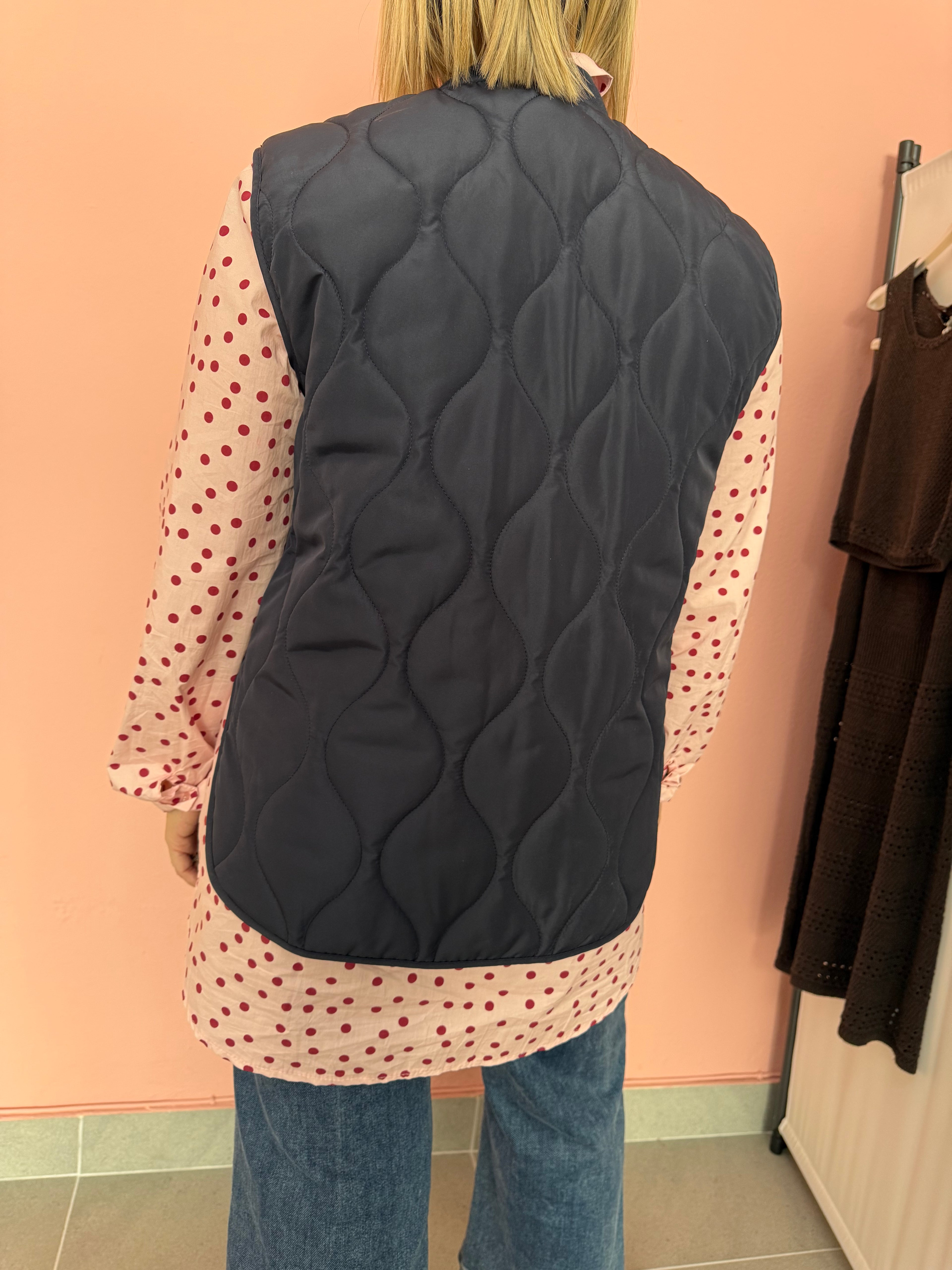 Gilet trapuntato over tasche